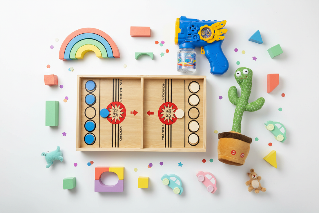 Colorful Go Baby toys flat lay including board game, cactus toy and bubble gun for 5-year-olds
