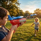 Child holding a2-in-1 Catapult Aircraft Gun Toy (Blue Plane Red Gun) with another child running in the background at sunset.
