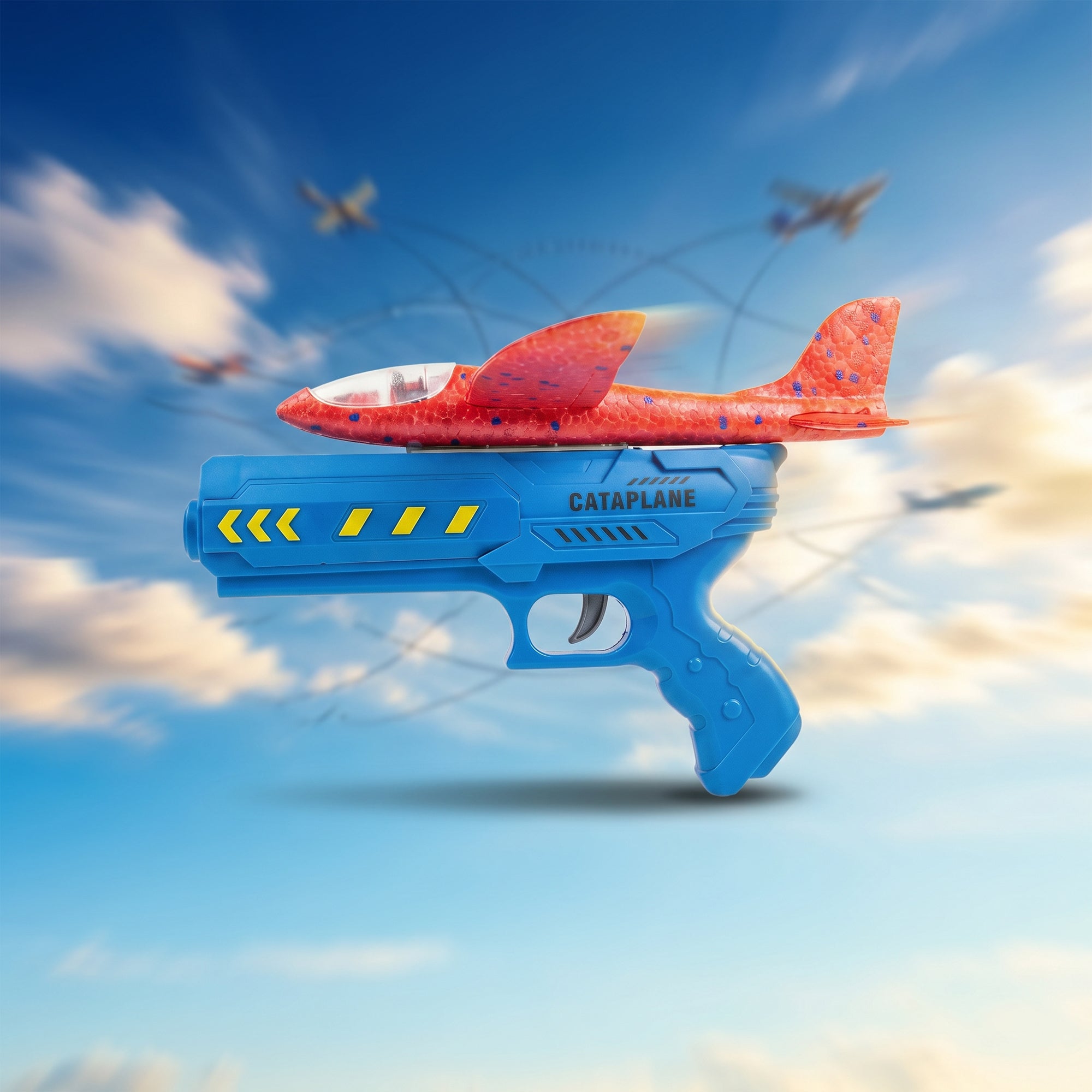 2-in-1 Catapult Aircraft Gun Toy (Red Plane Blue Gun) against a sky background