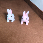 Plush Rabbit Jumping Toy set with soft pink and white bunny toys designed for fun hopping play and kids entertainment.