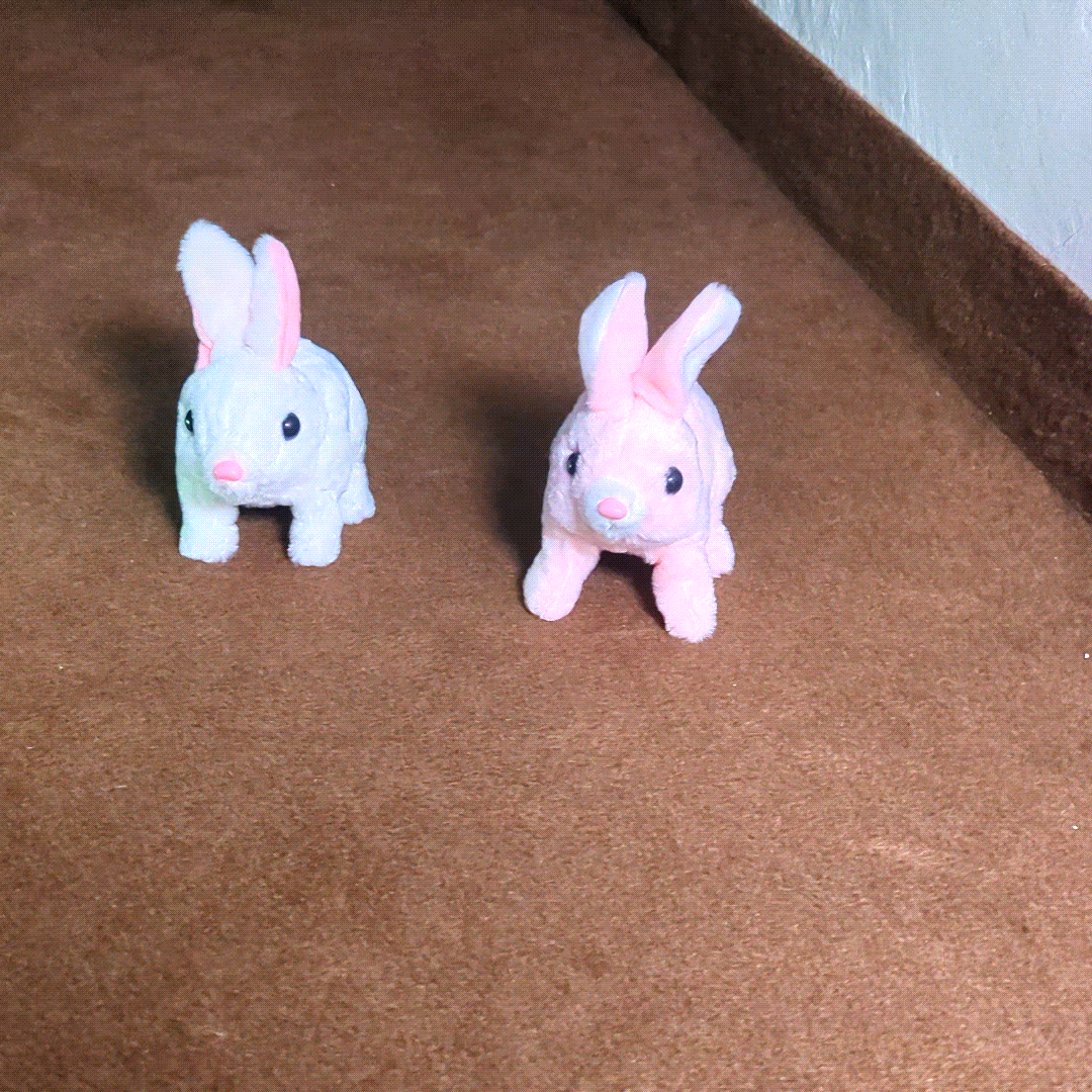 Plush Rabbit Jumping Toy set with soft pink and white bunny toys designed for fun hopping play and kids entertainment.