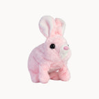 Pink plush rabbit toy on a white background