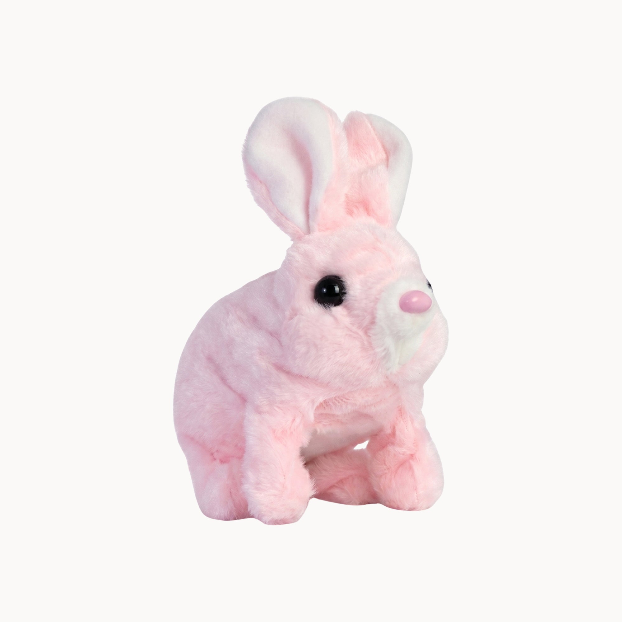 Pink plush rabbit toy on a white background